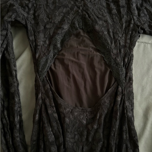 Long sleeve backless midi dress. Moda International. Size: XS - Picture 7 of 8